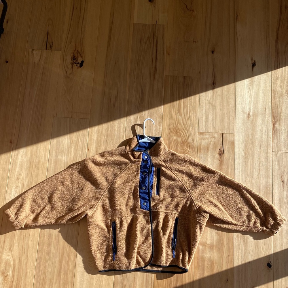 Brown and blue button-up sweater